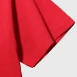 Close-up view of the red premium cotton fabric on a Hellstar Crack Print T-shirt showing texture and quality.