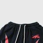 Waist detail of the Hellstar Red Flame sweatpants featuring an adjustable drawstring and vibrant red flame graphics.