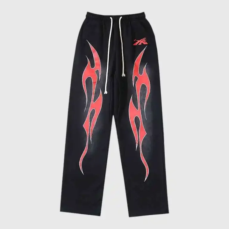 Hellstar Red Flame Sweatpants featuring a black vintage washed cotton base with bold airbrushed red flame graphics.