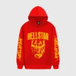 Red Hellstar Mask Print Hoodie featuring a bold yellow graphic on a premium fleece fabric streetwear sweatshirt.
