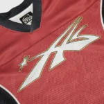 Close-up of the Hellstar red sports logo mesh long sleeve tee showing the detailed graphic and breathable fabric.