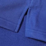 Close-up view of the reinforced hem detail and fleece texture on Hellstar No Guts No Glory shorts in royal blue.