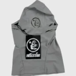Hellstar Shiesty Balaclava Ski Mask in gray featuring a distinctive logo print and an attached product clothing tag.