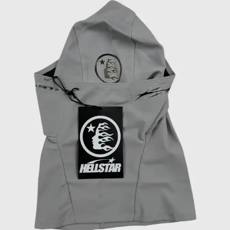 Hellstar Shiesty Balaclava Ski Mask in gray featuring a distinctive logo print and an attached product clothing tag.