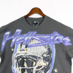 Hellstar Skull Helmet T-Shirt in dark grey featuring a vintage graphic screen print on premium 100% cotton fabric.