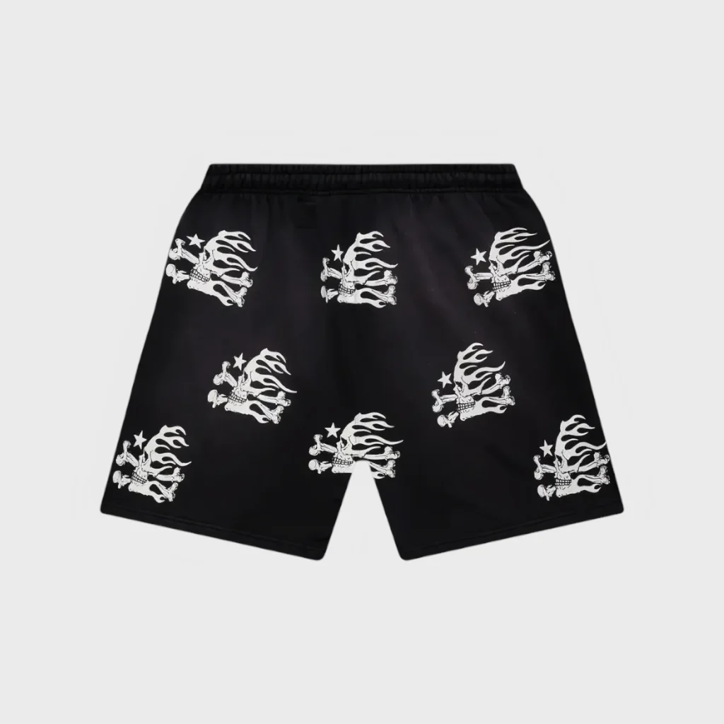 Back view of black Hellstar Skull Shorts featuring a repeating white flame and skull graphic print pattern on fleece fabric.