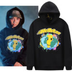 Model wears the black Hellstar Smiley World hoodie featuring a colorful globe and smiley face graphic screen print.