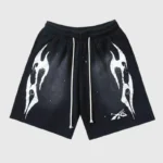Hellstar Snap Black Shorts with white graphic screen prints, featuring an adjustable drawstring and urban street design.