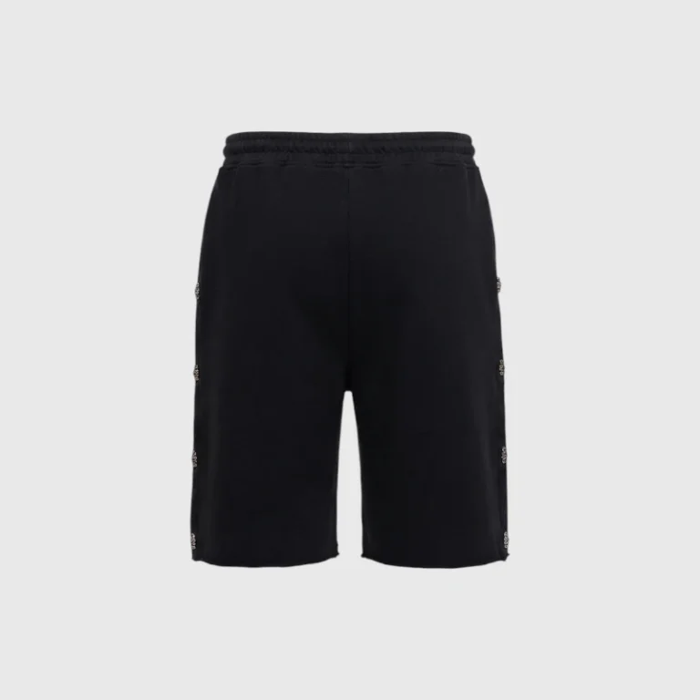 Front view of black Hellstar Snap shorts with detailed side snaps on a plain grey background for streetwear fashion.