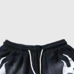 Hellstar Snap Black Shorts featuring a drawstring waist design and premium fabric in a relaxed streetwear style.