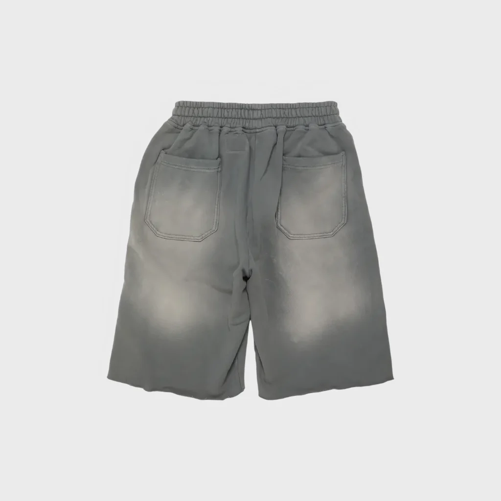 Back view of the grey Hellstar Snap Shorts showcasing the premium streetwear design with back pocket detailing.