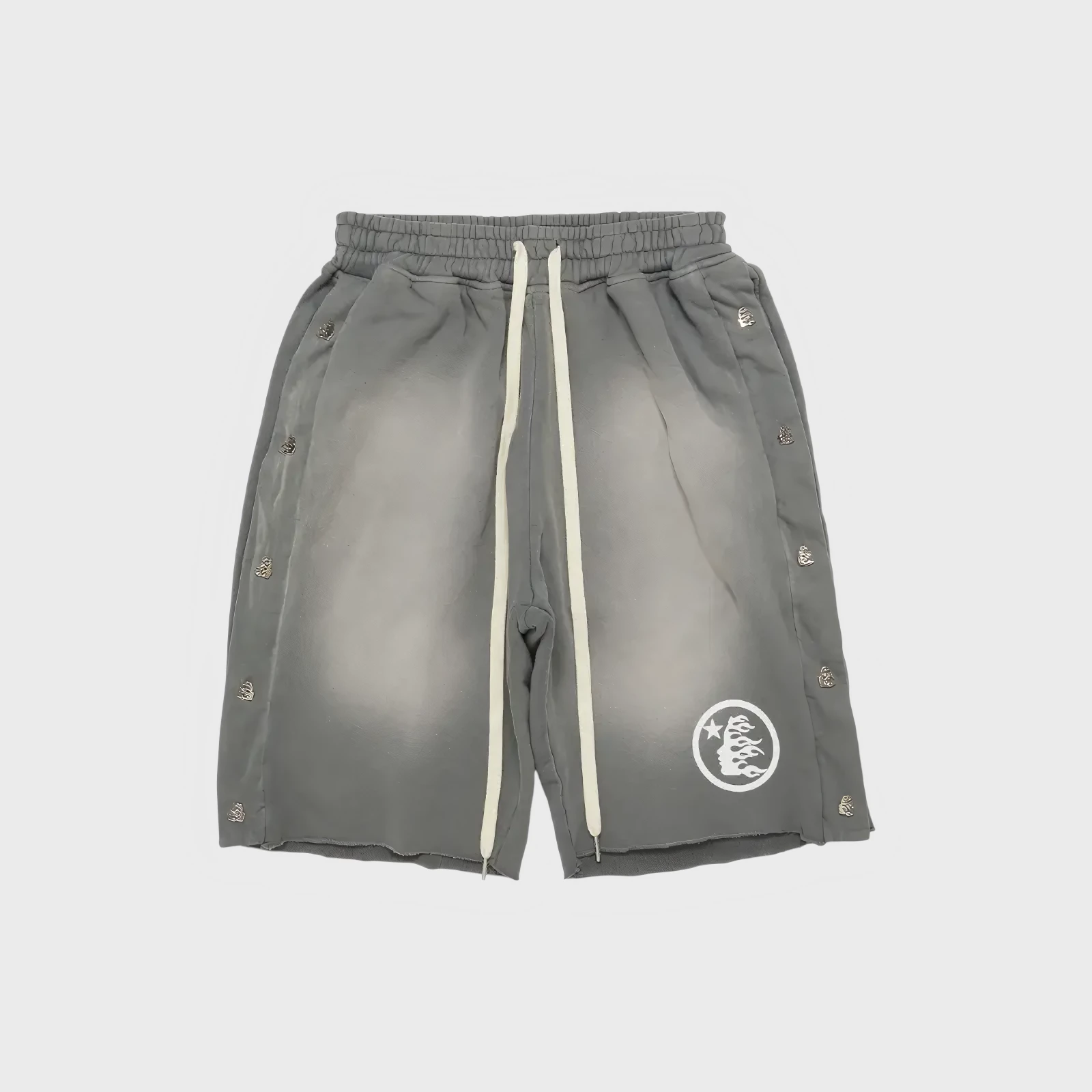 Hellstar Snap Shorts Grey Hellstar Snap Shorts in Grey, featuring side snap hardware and signature logo branding for premium streetwear style.