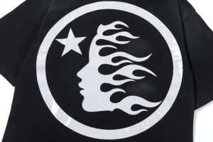 Hellstar Sport black T-shirt featuring a distinctive white graphic print of a profile with flames and a star inside a circle.