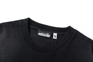 Close-up view of the collar and brand label on a black Hellstar Sport T-shirt showing quality stitching and branding.
