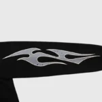 Close up of the Hellstar Sport gel logo featuring a distressed flame design on a black fabric background.