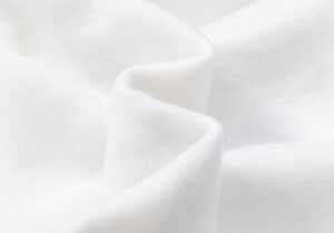 Close-up view of the premium soft white cotton fleece fabric used for the Hellstar Sport Hoodie streetwear design.