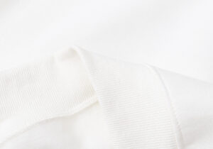 Close up of the premium white fabric texture on the Hellstar Sport Hoodie showing the quality of the cotton material.