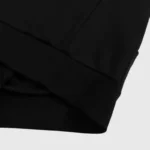Close-up view of the black fabric and premium construction of the Hellstar Sport Gel Logo Tracksuit sleeve cuff.