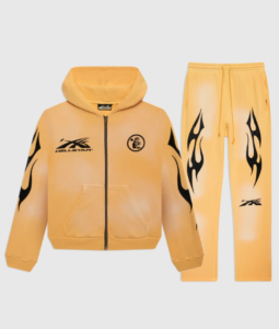 Men's Hellstar Sport yellow tracksuit featuring a zip-up hoodie and matching sweatpants with vintage flame graphics.