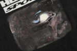 Detailed close-up of the vintage-inspired graphic featuring an eye on the Hellstar Sports 96 black crewneck sweatshirt.