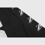Close-up view of the black Hellstar Sports 96 crewneck sleeve featuring the brand logo graphic in white print.