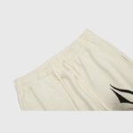 Beige Hellstar Sports sweatpants featuring an adjustable drawstring waistband and heavyweight fleece construction.