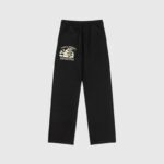 Hellstar Sports black fleece sweatpants with vintage wash, drawstring waist, and high-density graphic front print