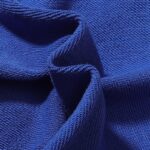 Close-up view of the premium blue fleece fabric texture used on the Hellstar Sports Gel hoodie and matching tracksuit.