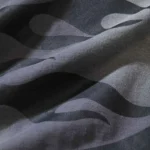 Close-up view of the premium fabric texture used for the Hellstar Sports Core Logo Gel T-Shirt in dark grey.