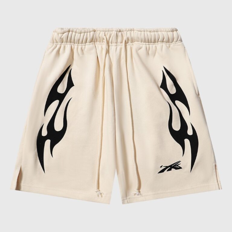 Hellstar Sports Flame shorts in beige featuring black cosmic flame graphics and a drawstring waist for a vintage look.