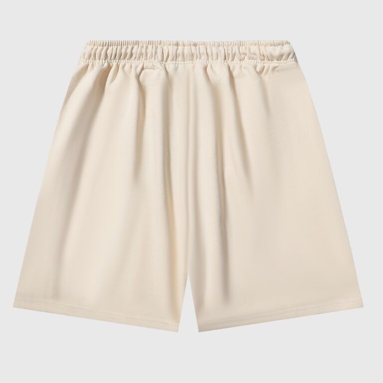 Back view of the Hellstar Sports Flame Shorts in a vintage washed beige color featuring an elastic drawstring waist.