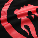 Close-up detail of the premium black cotton fabric featuring the distinctive red Future Flame graphic from Hellstar Sports.