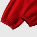 Close-up view of the elasticated ribbed cuffs on the vibrant red Hellstar Sports Gel performance sweatpants.