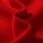 Detailed close-up view showing the vibrant red gel-infused fabric texture of the Hellstar Sports Gel sweatpant.