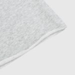 Close-up view of the premium heavyweight grey fleece fabric texture used in Hellstar Sports sweatpants.
