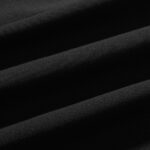 Close-up view of the premium black fabric texture used for the Hellstar Sports hoodie, showcasing its soft quality.