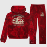 Hellstar Sports red tye-dye skull tracksuit featuring a vintage streetwear aesthetic with graphic hoodie and pants.