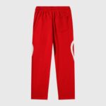 The back view of the Hellstar Sports Red Tracksuit pants featuring a comfortable vintage fit and elastic waist.