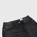 Premium black denim jeans from Hellstar featuring a signature Sports Star graphic print and a classic button closure.