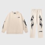 Hellstar Sports Tracksuit in cream featuring a relaxed fit, signature streetwear branding, and unique flame graphics.