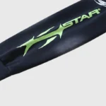Close-up view of a black Hellstar Sports graphic print tracksuit sleeve featuring the brand logo in lime green text.
