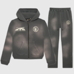 Hellstar Sports grey unisex tracksuit featuring a zip-up hoodie and matching sweatpants with vintage washed effects.