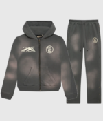 Hellstar Sports grey unisex tracksuit featuring a zip-up hoodie and matching sweatpants with vintage washed effects.