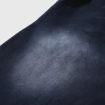 Close-up view of the premium washed black fabric detail on the Hellstar Sports Graphic Print Tracksuit set.