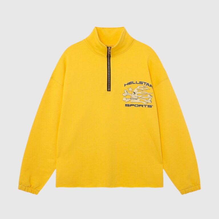 Bright yellow Hellstar Sports half-zip sweatshirt featuring a graphic skull and flame logo on the chest area.