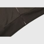 Close-up view of the premium cotton fabric and metal zipper detail on the Hellstar Sports Jet-Black Zip-Up Hoodie.