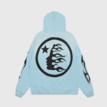 Back view of the light blue Hellstar Sports zip-up hoodie featuring a black flame graphic and logo on the back.
