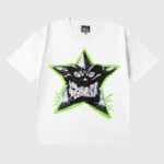 White Hellstar T-shirt featuring a monstrous star graphic with a fierce face and neon green outline for streetwear.