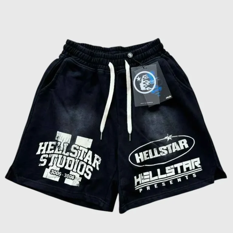 Front view of black Hellstar Studio fleece shorts featuring a white graphic logo, elastic drawstring waist, and pockets.