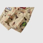 Hellstar Studios Bermuda War cargo shorts featuring a desert camo map print and signature graphic patches detail.